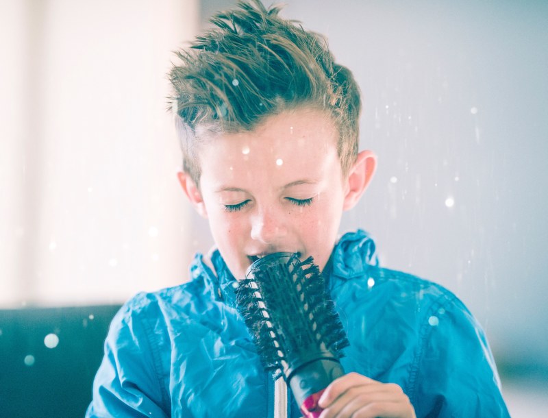 young boy in the room dreams to sing and dream 4k