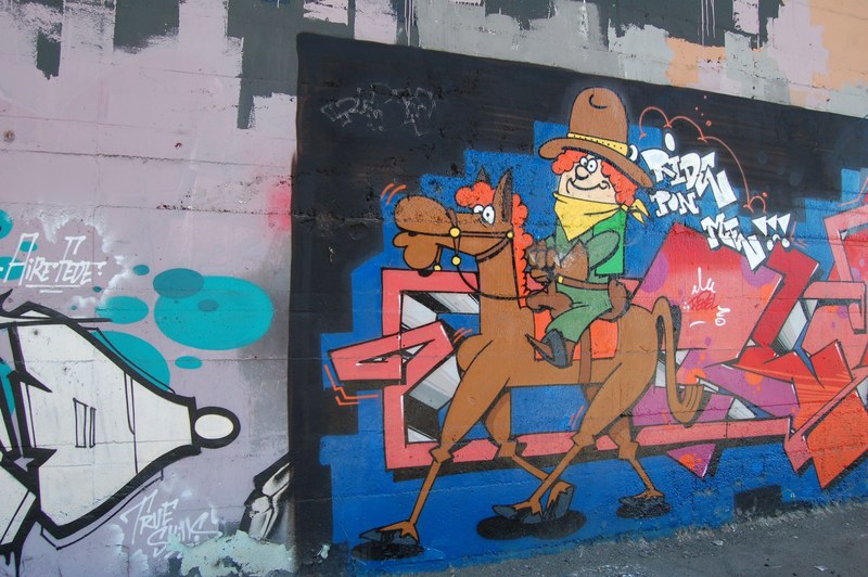 a wall mural of a ginger riding a horse, _orange hair riding horse mural 4k
