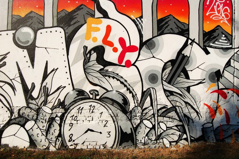 graffiti writing on a wall with a clock and dynamite, _clock graffiti writing 4k