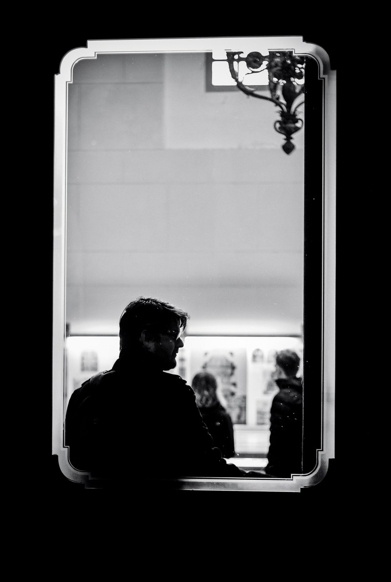 man in a window 4k