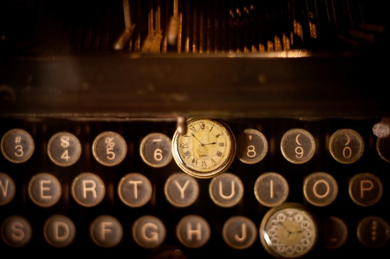 an old pocket watch on a vintage typewriter, vintage watch and typewriter 4k