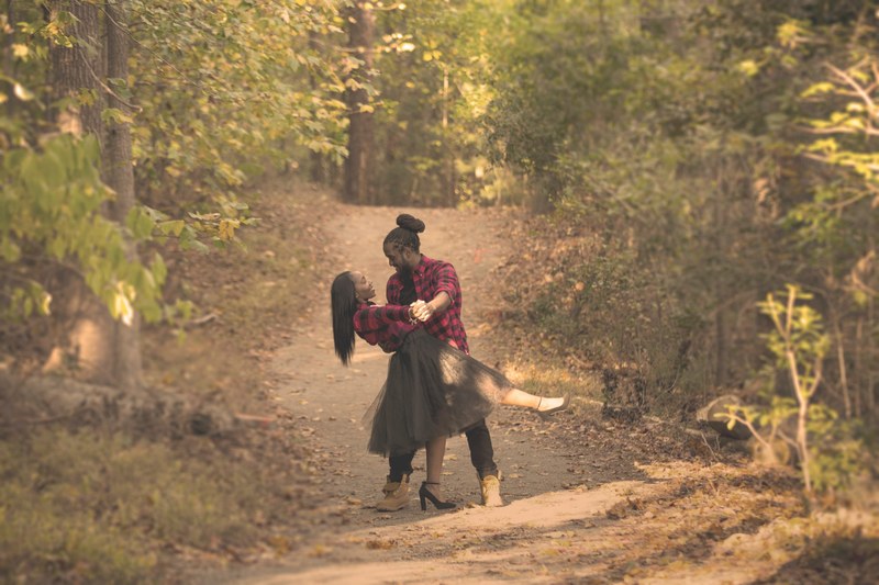 a couple standing in a nature trail embracing each other, _couple holding close 4k