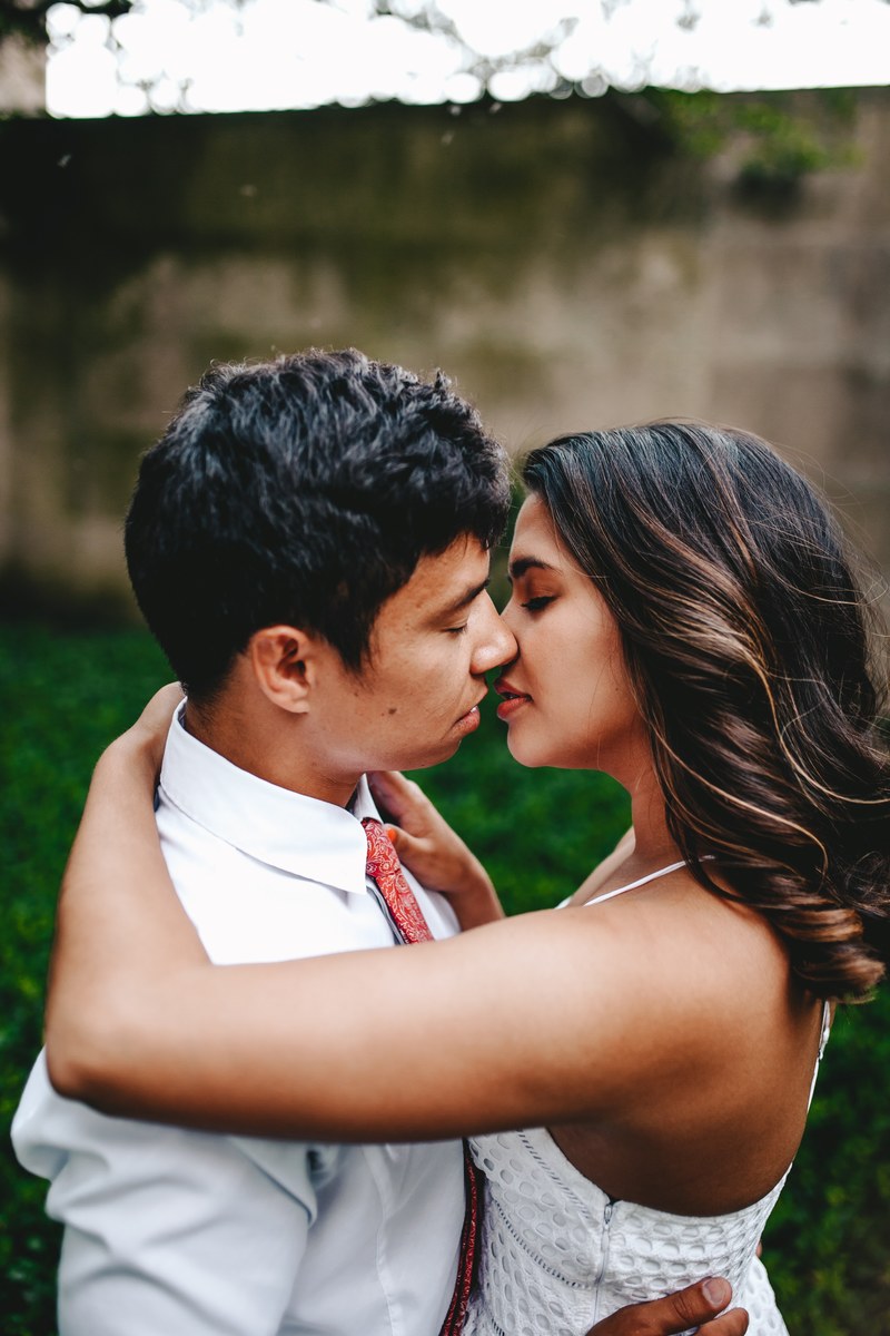 a man and woman embracing for a kiss, _couple kissing 4k