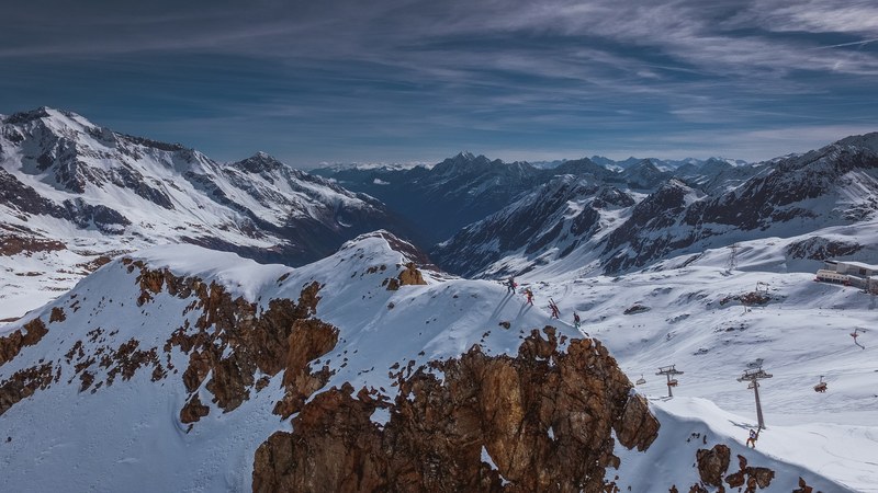 snowy mountains and rocky cliffs in austria, is being small being free 4k