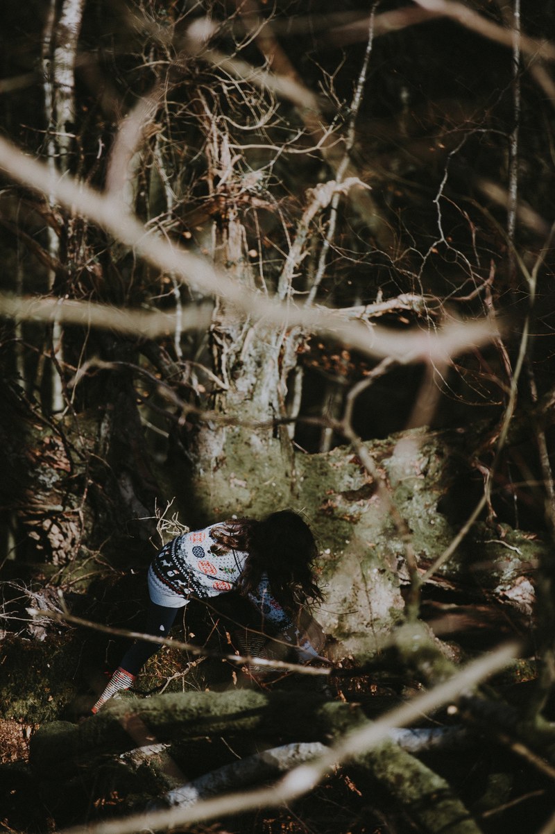 child climbing in the woods 4k