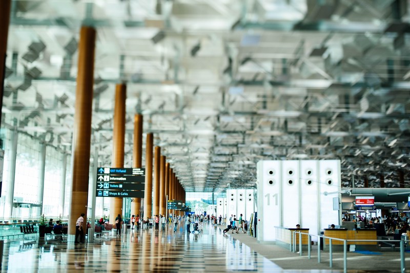 inside a spacious airport departure hall, _airport departure hall 4k