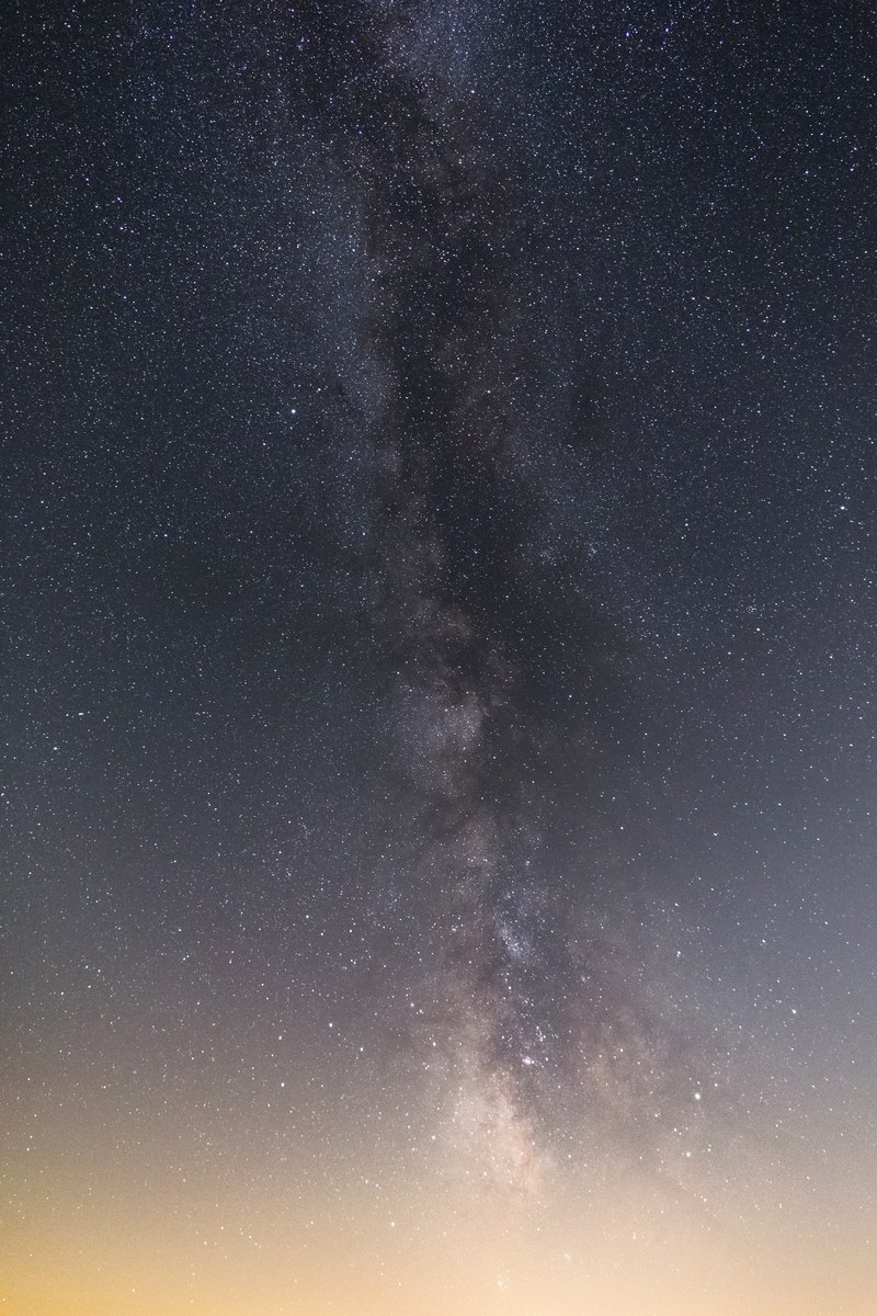 milky way galaxy rising above light pollution 4k