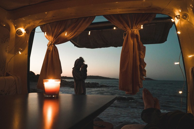 a romantic table setting over the water, _vanlife 4k