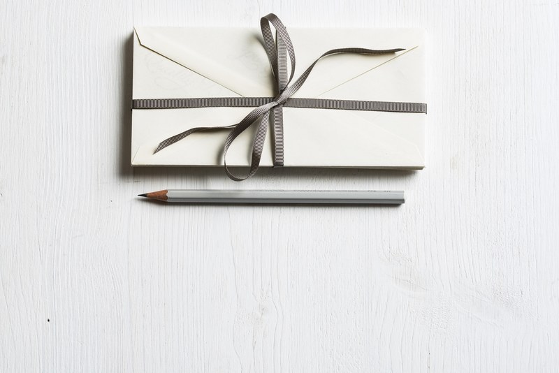 envelope desk pencil and letter 4k