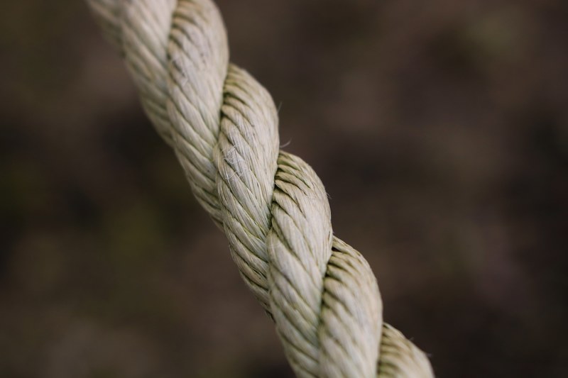 a macro shot of two pieces of rope linked together, double rope up close 4k