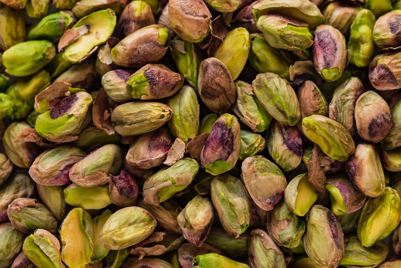 pile of raw green pistachios nuts, healthy pistachio snack 4k