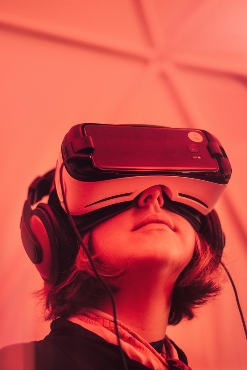 a person in a virtual reality headset and headphones, vr 4k