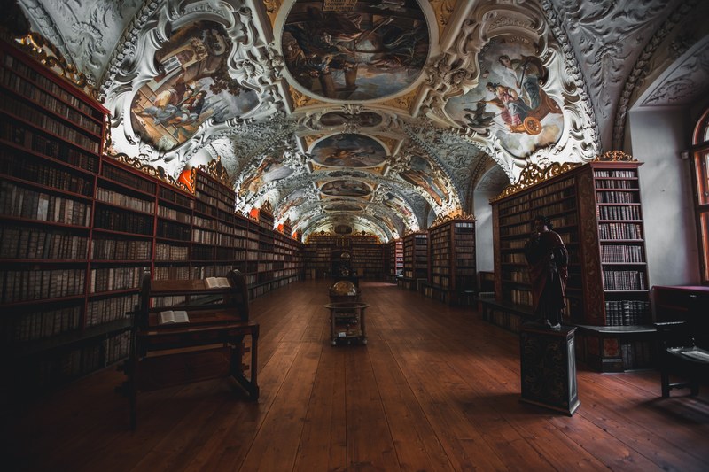a library with a beautifully painted ceiling in prague, prague library 4k