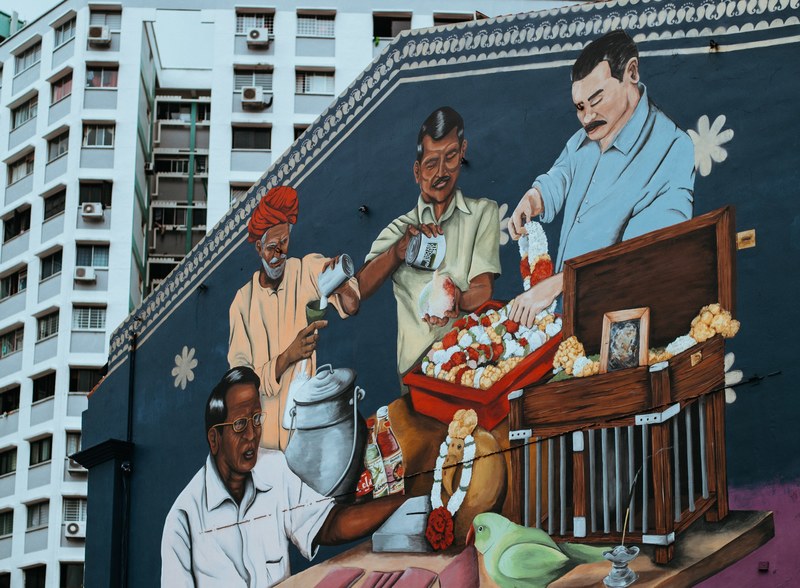 graffiti mural of four men performing cultural ritual on urban building wall in singapore, mural of men in singapore 4k