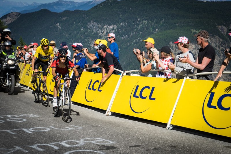 cyclists and a dirt bike passing fans at the tour de france race in france, tour de france stage 16 2016 4k