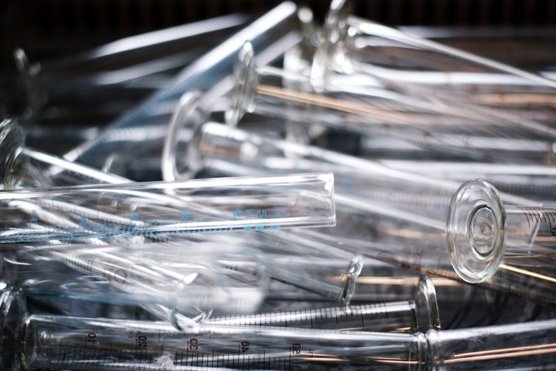 a heap of empty test tubes, test tubes in a lab 4k