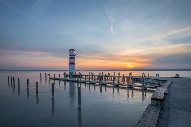 sunset water lighthouse and ocean 4k
