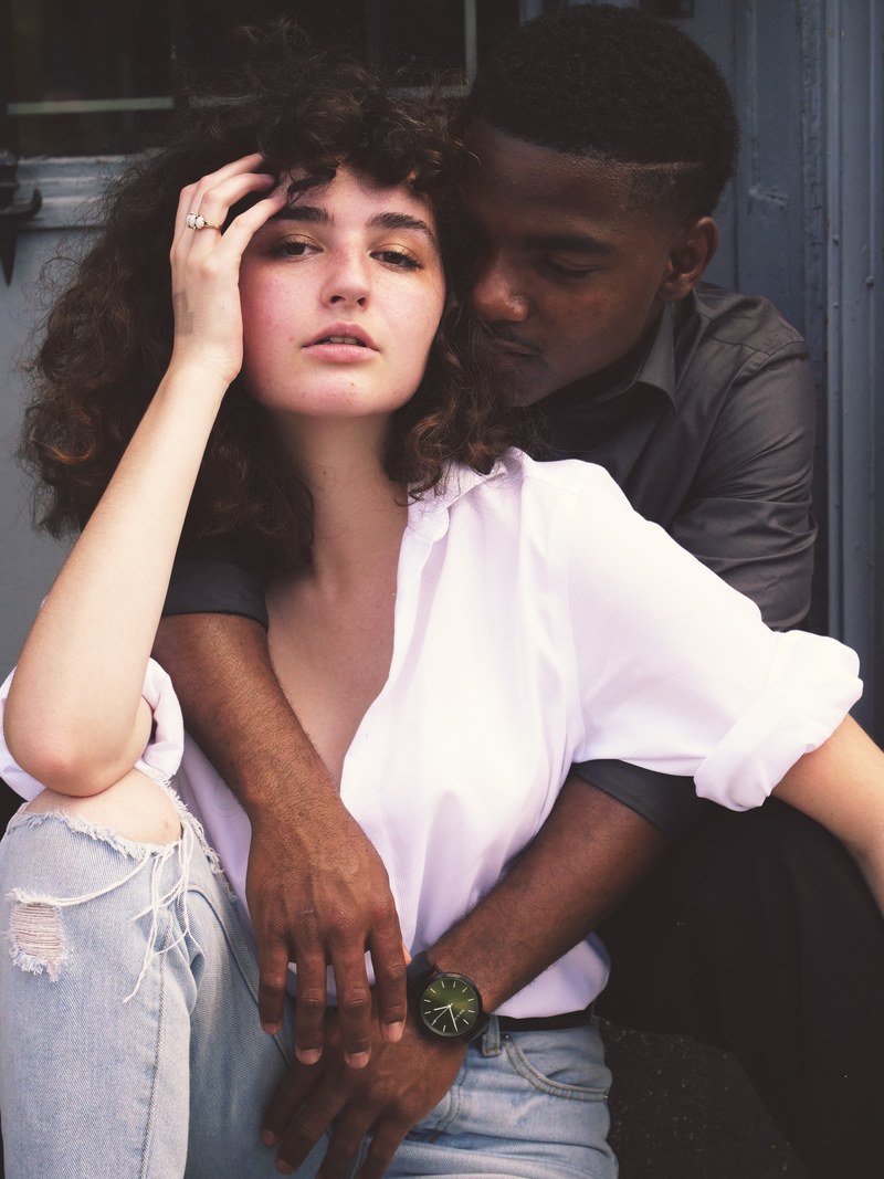 couple sitting and hugging in a romantic embrace, lost in the sauce 4k