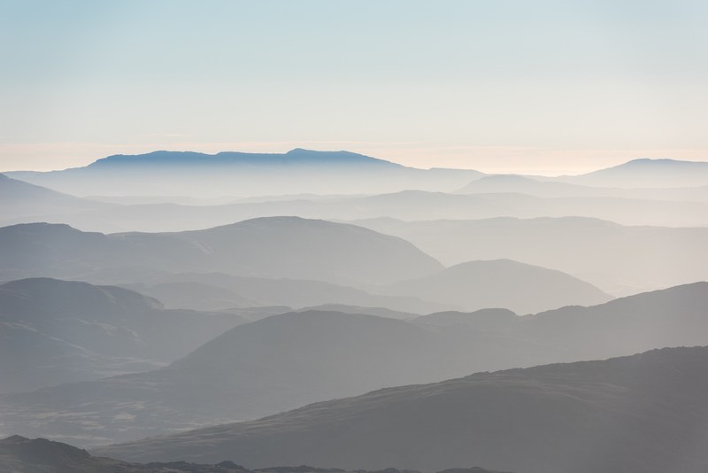 rolling fog over hilly mountains during sunrise at snowdonia national park, one morning in snowdonia 4k