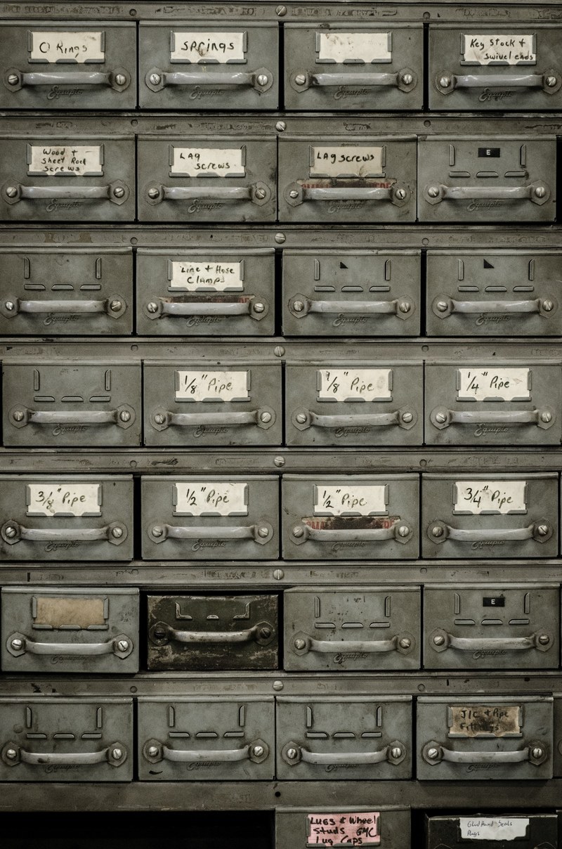 an old document cabinet with small drawers, organized document cabinet 4k