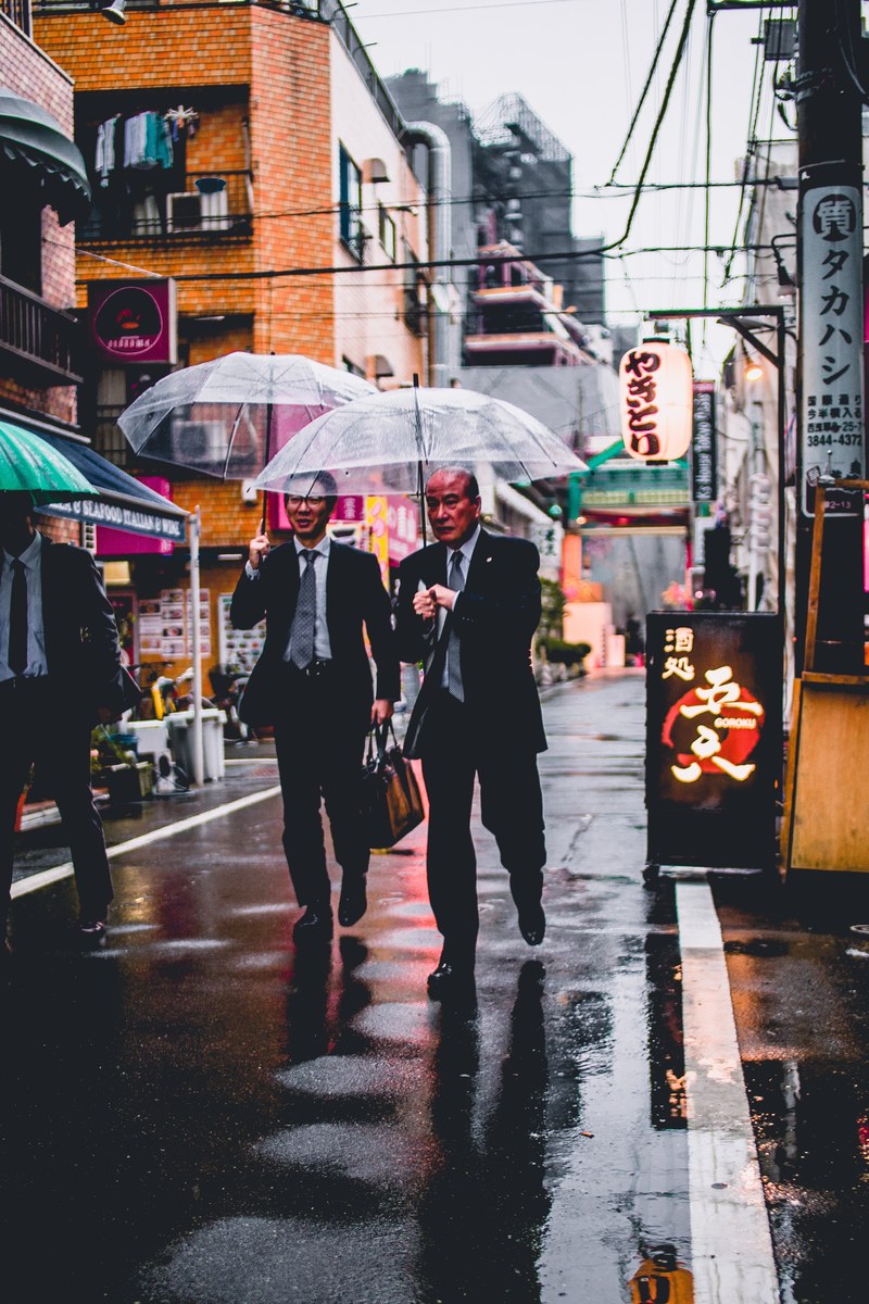two businessmen with transparent umbrellas on a side street in asakusa, businessmen with umbrellas 4k