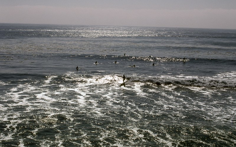 surfers at santa cruz 4k