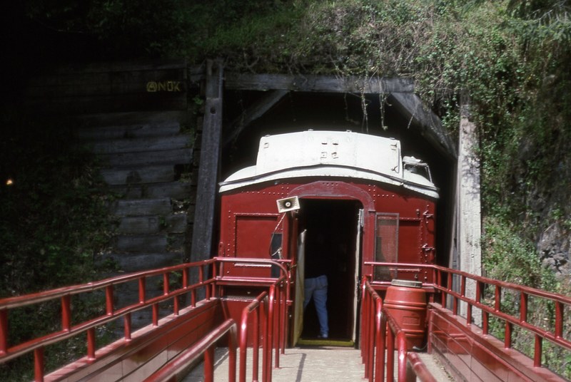 skunk train passing trough a tunnel 4k
