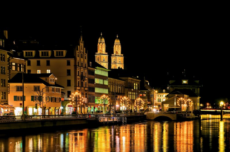 waterfront city at night building and reflection 4k