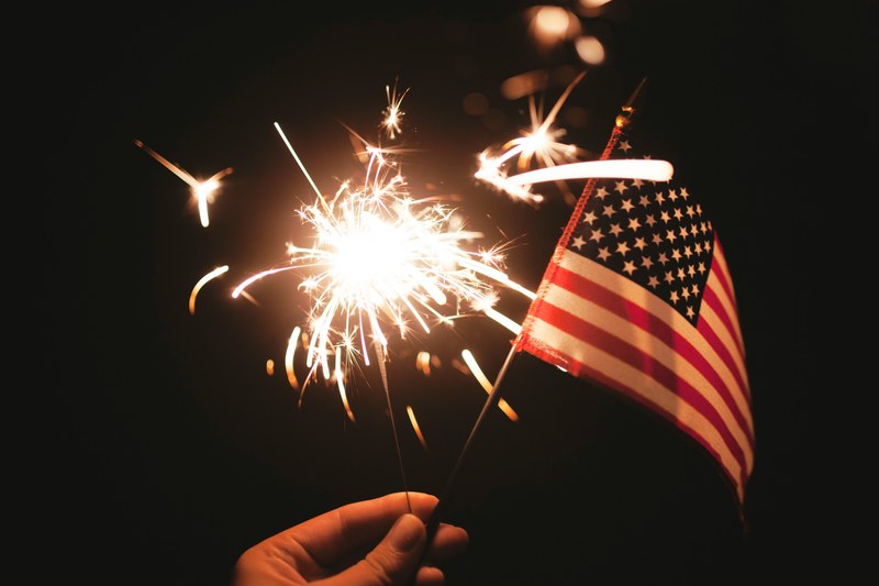 firework flag sparkler and hand 4k