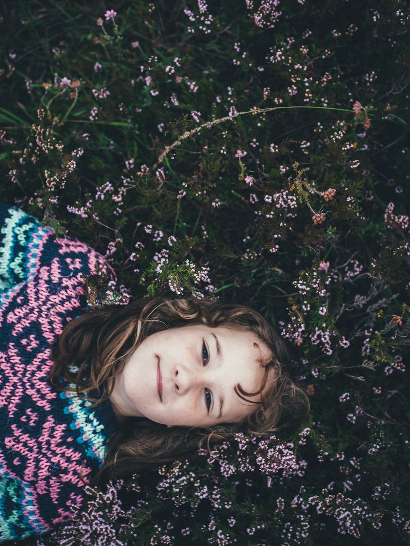 girl lying in heather 4k