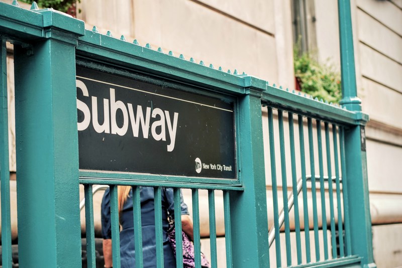 a subway sign at the entrance to new yorks underground transit system, new york subway entrance 4k