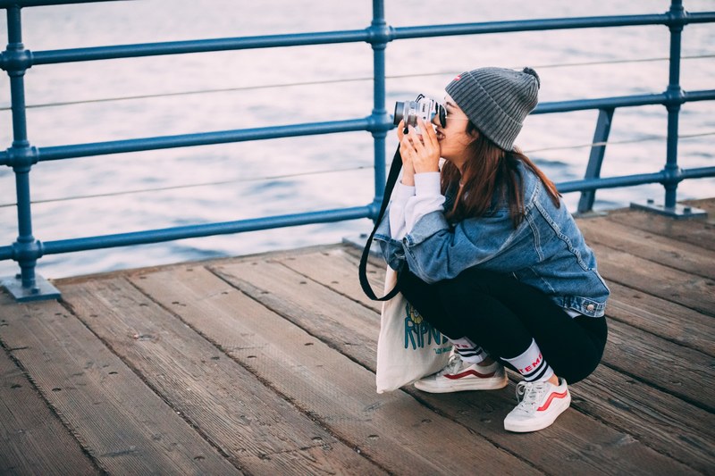 hipster girl taking a photo_ 4k