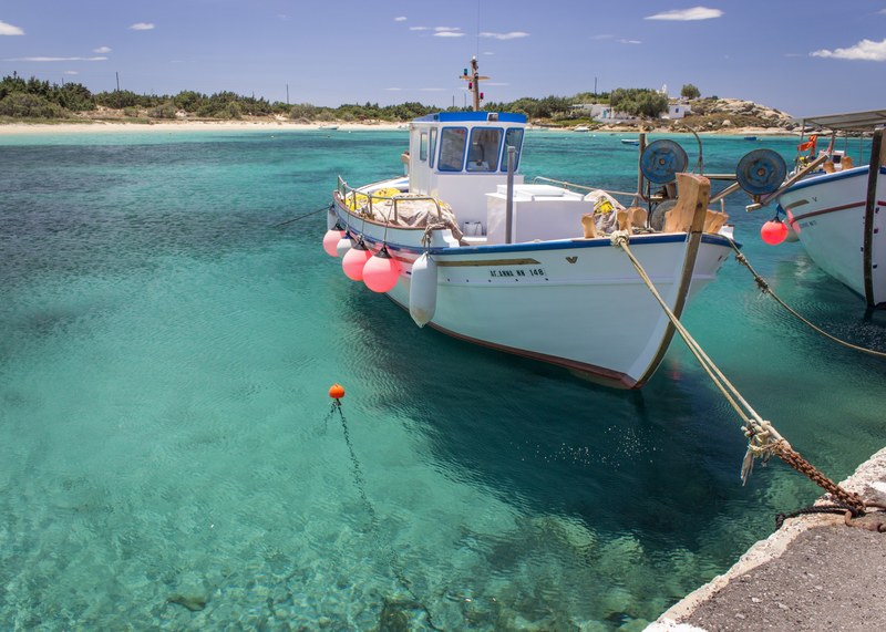 small fishing boat moored to the dock at naxos, moored fishing boat 4k