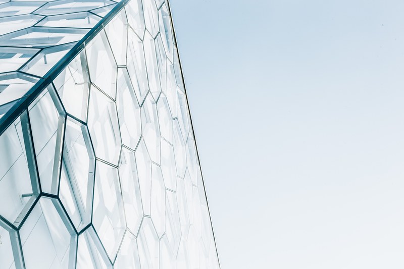a honeycomb pattern in the modern facade of a building in brussels, honeycomb pattern in a facade 4k