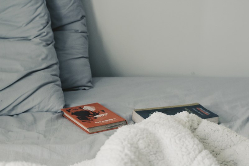 bed pillow sheets and book 4k
