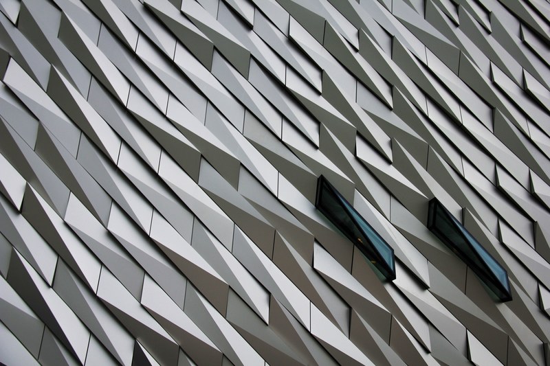 undulating abstract shapes on a building facade at the titanic memorial garden, _abstract shapes facade 4k