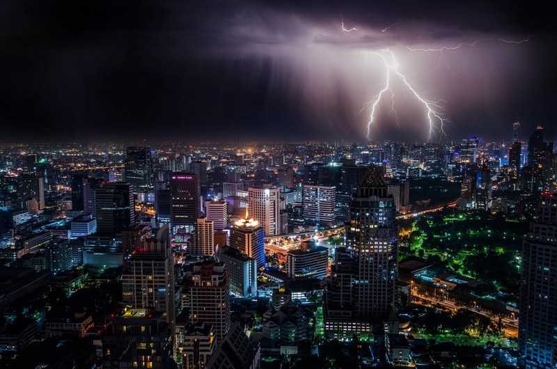lighting strikes on a stormy night over bangkoks skyline, lighting storm at night 4k
