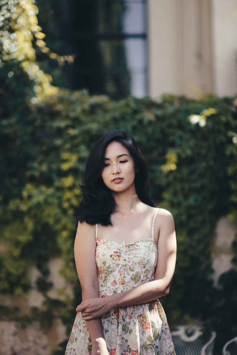 an asian woman looking at the camera in her prom dress, _asian woman prom dress 4k