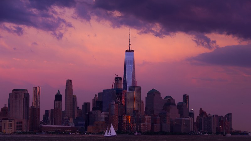 view of the new york city skyline with a beautiful pink and purple sunset, pink and purple skyline 4k