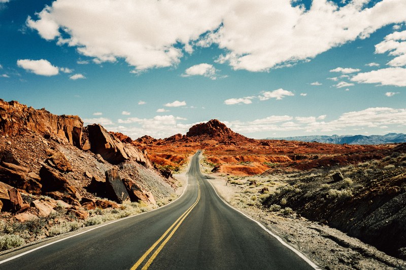 open road in red rocky desert terrain of valley of fire state park, valley of fire 4k