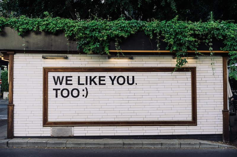 we like you too written on a white brick wall, we like you too 4k