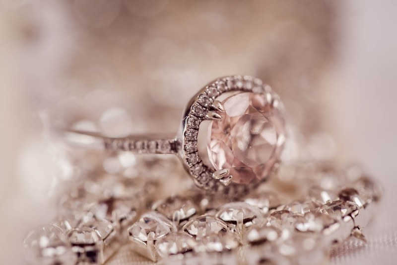 stunning diamond wedding ring surrounded by more diamonds, wedding ring macro 4k