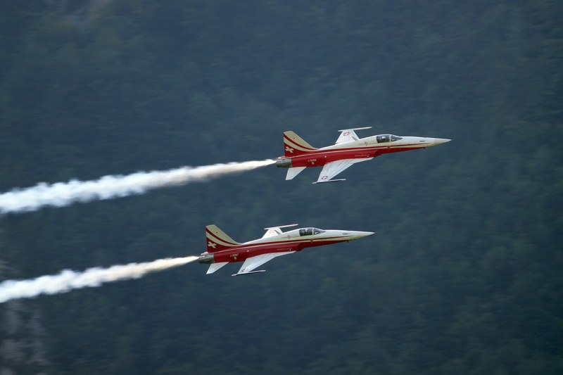 a couple of jet planes with a trail of smoke emitting from the back, _jet plane smoke 4k
