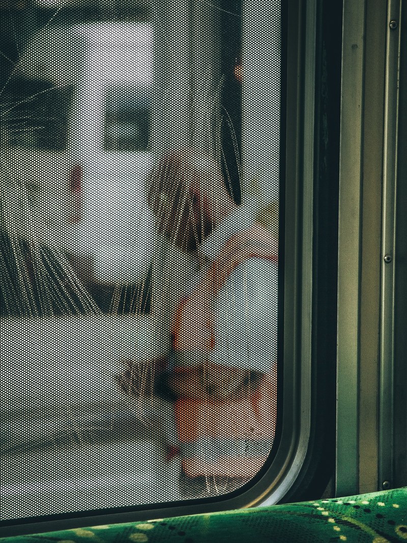 a scratched window on a subway train at flinders street railway station, flinders street station 4k
