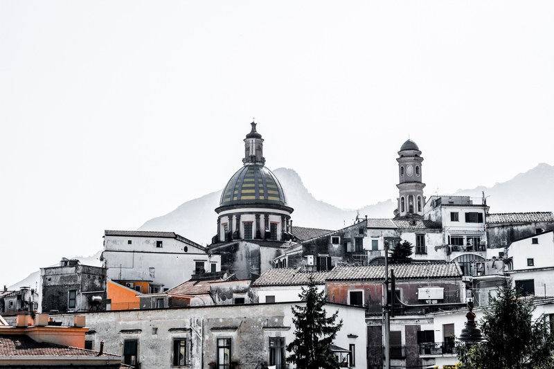 a desaturated shot of houses and rooftops near the amalfi cathedral in southern italy, italian rooftops 4k