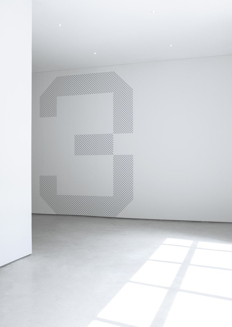 a large number three painted on a white wall in an empty room, number three in a white room 4k