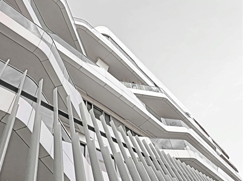 patterns formed by unique white architecture on an office building, white corporate offices 4k