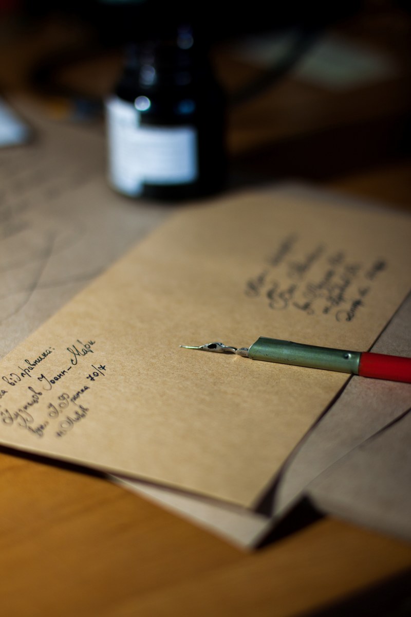 a brown envelope with from and to info written on it, _written brown envelope 4k