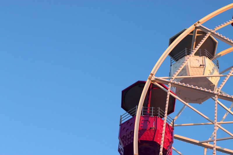 fancy and colorful looking ferris wheel in tibidabo carnival, ferris wheel at tibidabo summer 4k