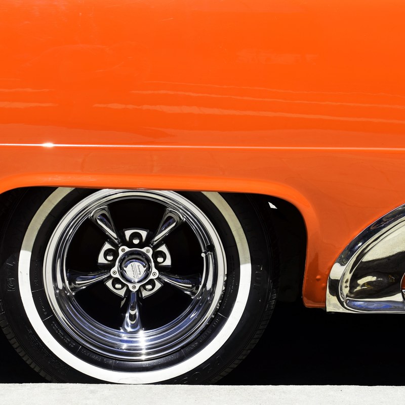 a classic tire on an orange sports car in havana, orange sports classic car 4k